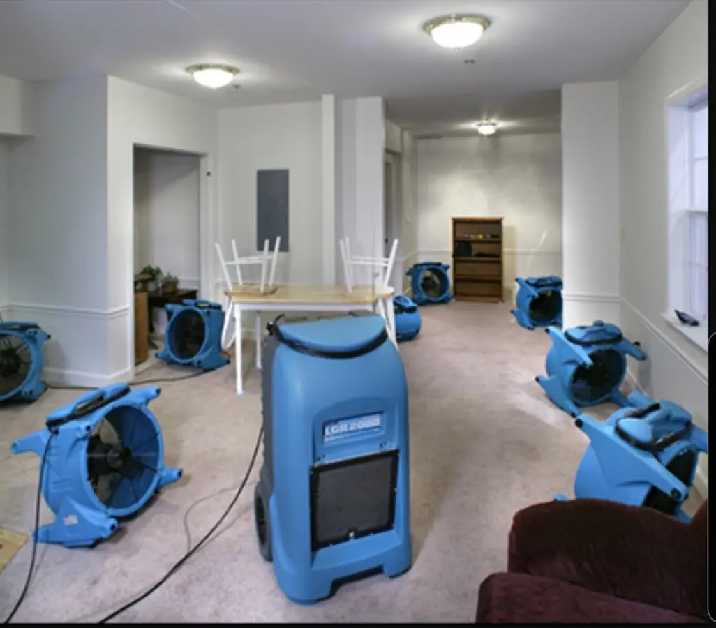 Air movers and dehumidifier setup for Water Damage Restoration in Brighton